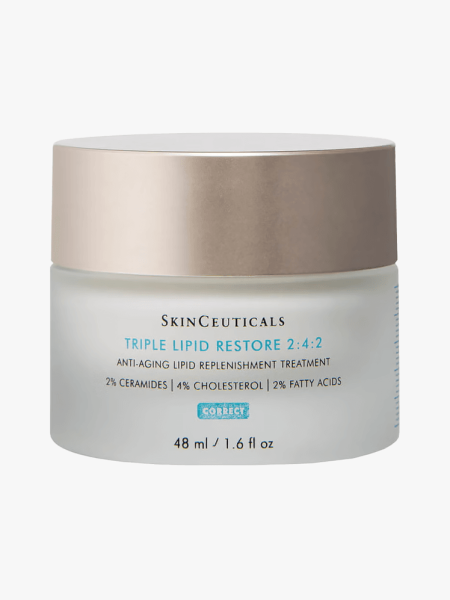 Triple Lipid Restore in frosted jar with silver lid on light gray background